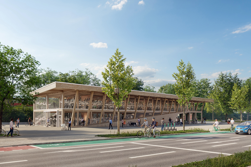 Visualisierung eines Fahrradparkhauses in Holzbauweise auf einem Bahnhofsvorplatz